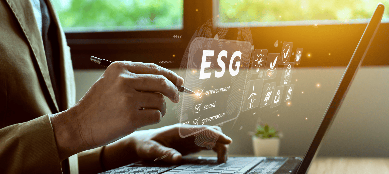 Person looking at computer with floating ESG showcasing US policies